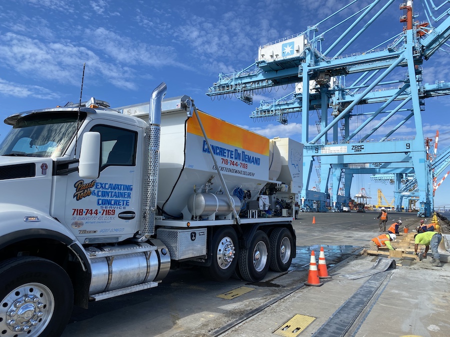Volumetric mixer truck staged for a pour at a container terminal